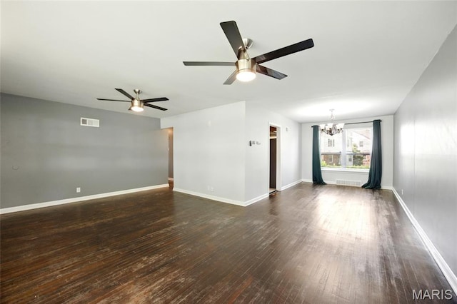 7448 Ahern Ave, Saint Louis, MO 63130 - spare room with a ceiling fan, a chandelier, and dark wood-style flooring