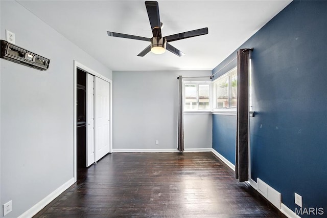 7448 Ahern Ave, Saint Louis, MO 63130 - unfurnished bedroom featuring wood finished floors, a closet, and a ceiling fan