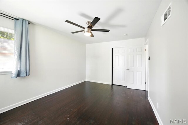 7448 Ahern Ave, Saint Louis, MO 63130 - unfurnished bedroom featuring wood finished floors and a ceiling fan