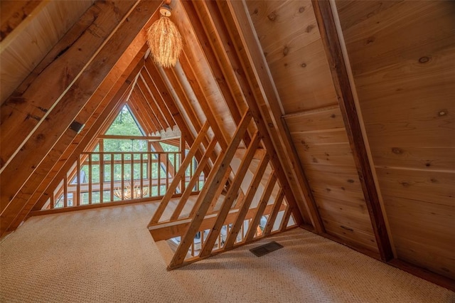1129 Mitten Ridge Dr, Innsbrook, MO 63390 - staircase featuring lofted ceiling and carpet