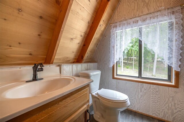 1129 Mitten Ridge Dr, Innsbrook, MO 63390 - bathroom with vanity, toilet, wooden ceiling, wallpapered walls, and wood finished floors