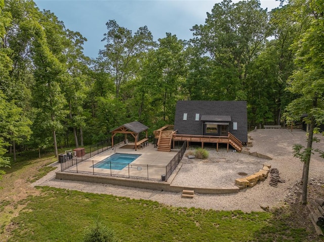 1129 Mitten Ridge Dr, Innsbrook, MO 63390 - view of swimming pool with a gazebo, a deck, stairs, and a patio area