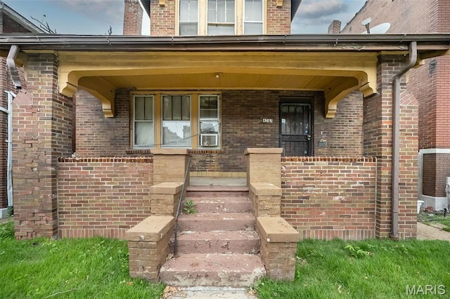 4545 Alice Ave, Saint Louis, MO 63115 - entrance to property featuring brick siding and covered porch