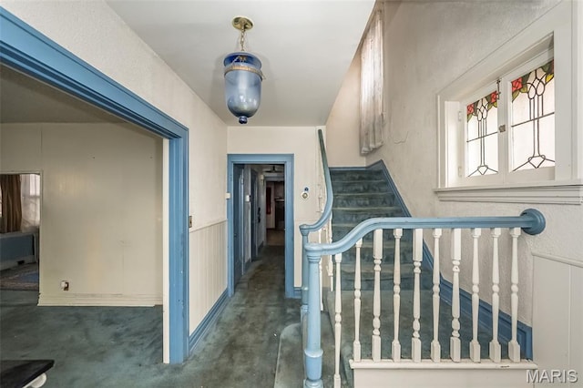 4545 Alice Ave, Saint Louis, MO 63115 - staircase with wainscoting