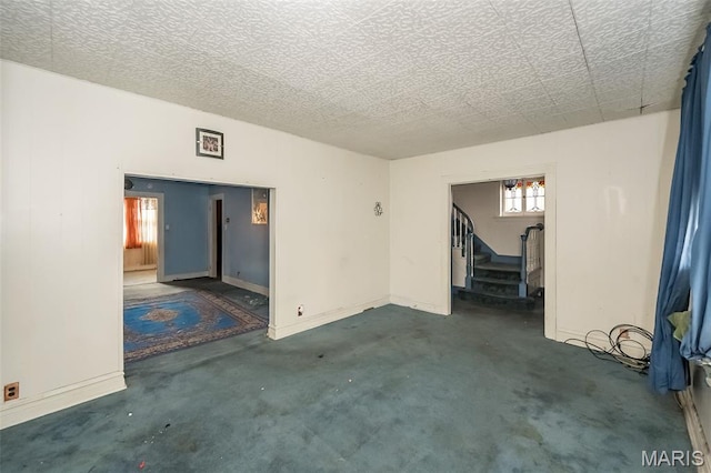 4545 Alice Ave, Saint Louis, MO 63115 - empty room featuring stairway and baseboards