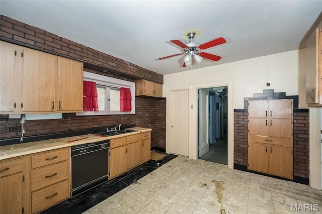 4545 Alice Ave, Saint Louis, MO 63115 - kitchen featuring dishwasher, a ceiling fan, light countertops, light floors, and brick wall