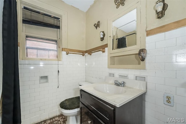 4545 Alice Ave, Saint Louis, MO 63115 - bathroom with tile walls, vanity, and curtained shower