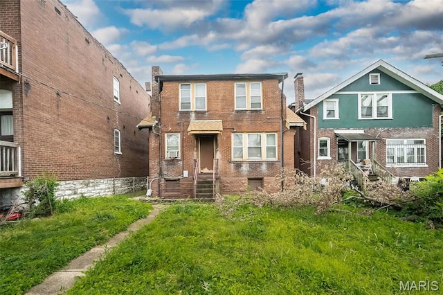 4545 Alice Ave, Saint Louis, MO 63115 - rear view of house with brick siding