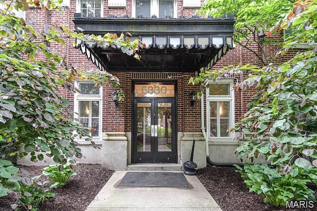 5330 Pershing Ave Unit 402, Saint Louis, MO 63112 - entrance to property with french doors and brick siding