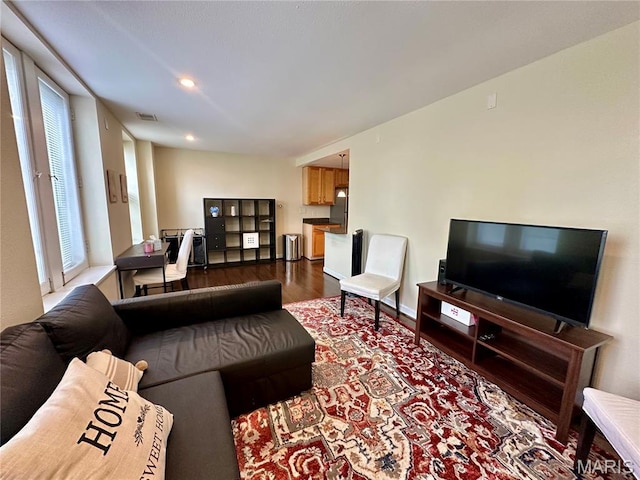 5330 Pershing Ave Unit 402, Saint Louis, MO 63112 - living area featuring dark wood-style floors and recessed lighting