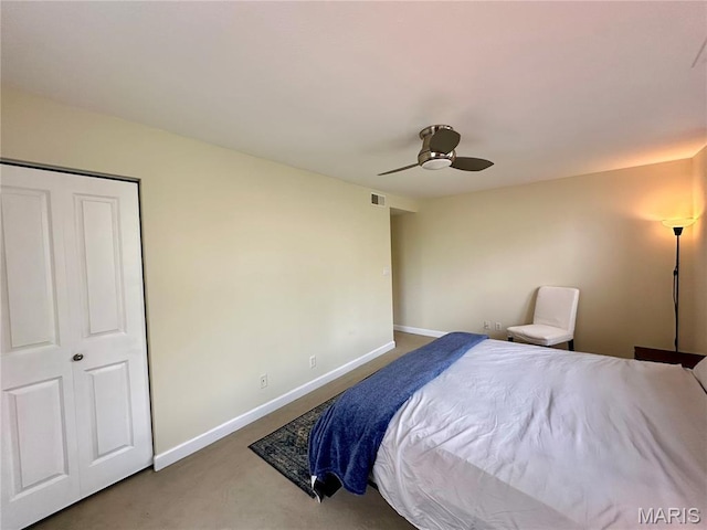 5330 Pershing Ave Unit 402, Saint Louis, MO 63112 - bedroom featuring carpet flooring, baseboards, and a ceiling fan