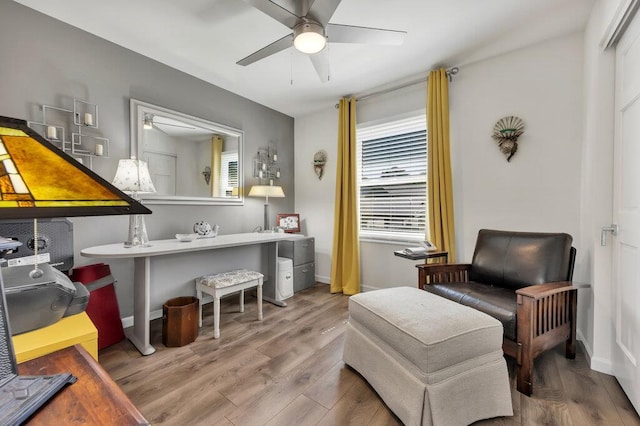 11943 Brookington Dr, Bridgeton, MO 63044 - living area with a ceiling fan, plenty of natural light, and wood finished floors