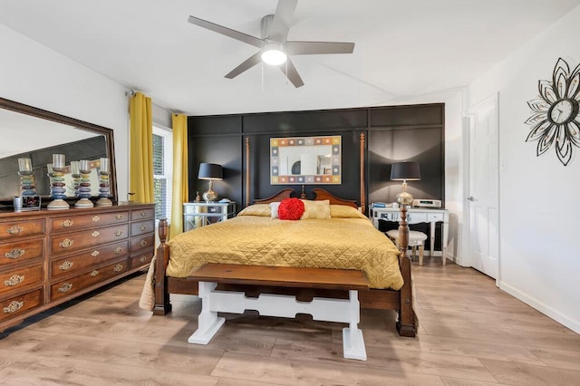11943 Brookington Dr, Bridgeton, MO 63044 - bedroom with wood finished floors, a ceiling fan, and baseboards