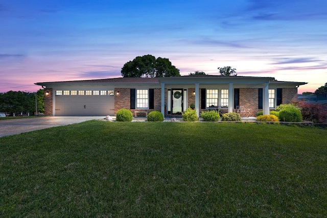 11943 Brookington Dr, Bridgeton, MO 63044 - single story home featuring brick siding, an attached garage, driveway, and a lawn