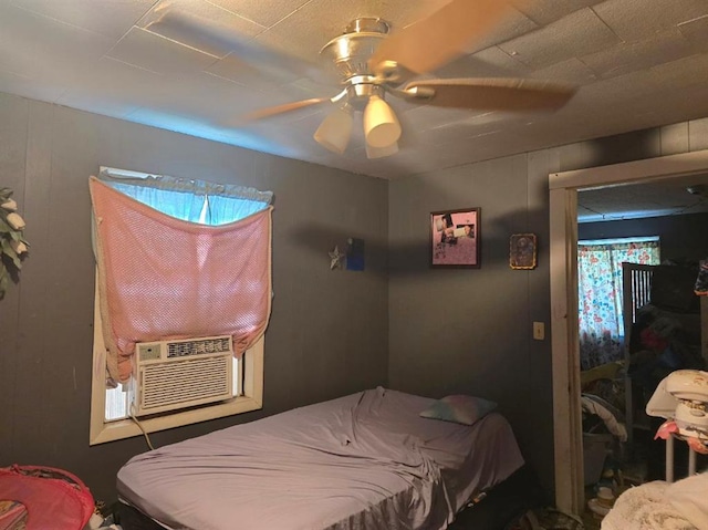 602 Center St, Bloomfield, MO 63825 - bedroom with ceiling fan and cooling unit