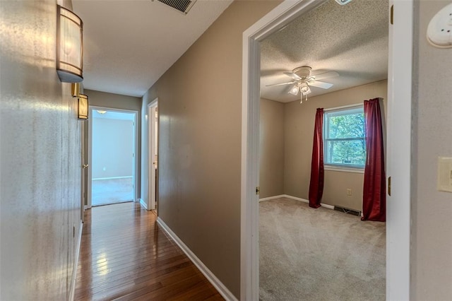 21509 Rockwell Dr, Lebanon, MO 65536 - hall featuring baseboards and wood finished floors