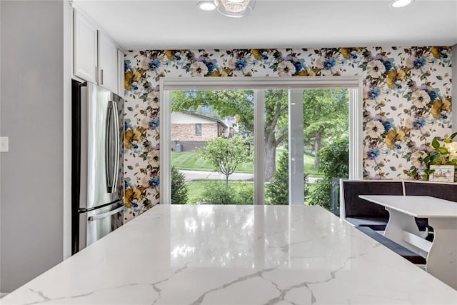 402 Glan Tai Dr, Manchester, MO 63011 - dining area with wallpapered walls, healthy amount of natural light, and recessed lighting