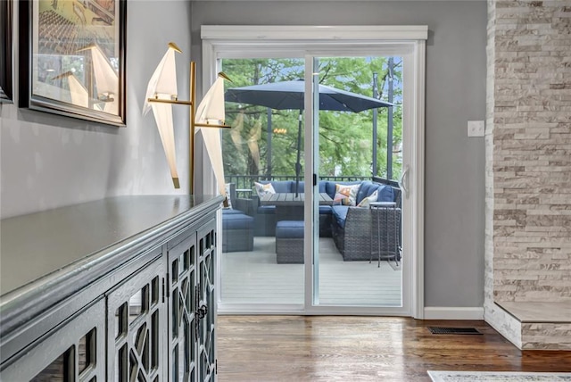 402 Glan Tai Dr, Manchester, MO 63011 - doorway with wood finished floors and baseboards
