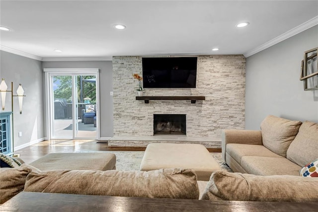 402 Glan Tai Dr, Manchester, MO 63011 - living room with crown molding, wood finished floors, recessed lighting, a fireplace, and baseboards