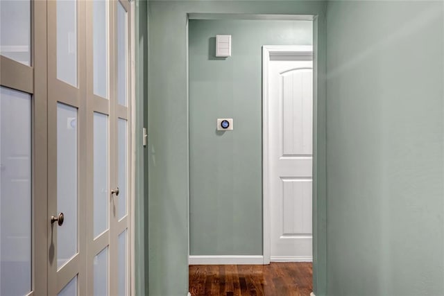 402 Glan Tai Dr, Manchester, MO 63011 - hallway featuring dark wood-style floors and baseboards