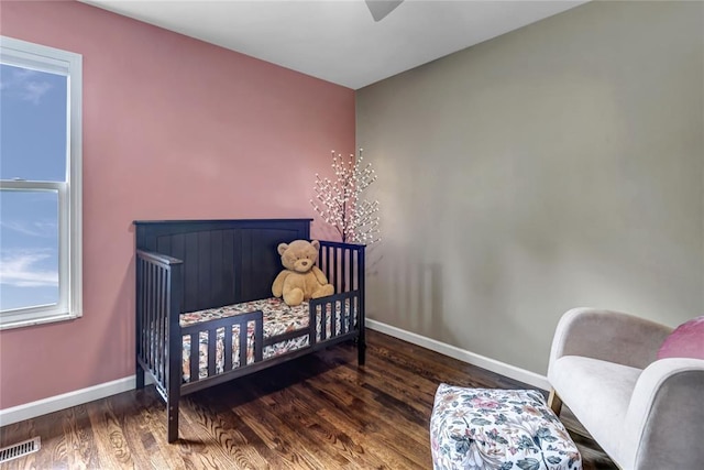 402 Glan Tai Dr, Manchester, MO 63011 - bedroom with wood finished floors and baseboards