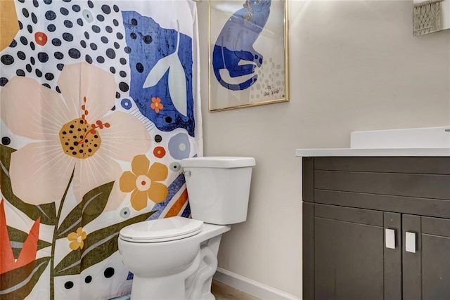 402 Glan Tai Dr, Manchester, MO 63011 - bathroom featuring baseboards, toilet, and vanity