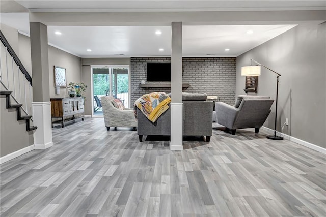 402 Glan Tai Dr, Manchester, MO 63011 - living area with stairway, light wood-type flooring, recessed lighting, baseboards, and ornamental molding