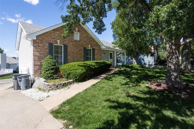 4 Aken Ct, Saint Peters, MO 63376 - view of side of home featuring a lawn and brick siding