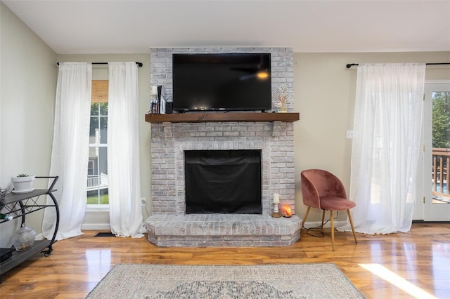4 Aken Ct, Saint Peters, MO 63376 - living area featuring wood finished floors and a fireplace