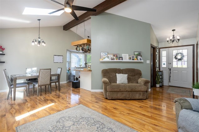 4 Aken Ct, Saint Peters, MO 63376 - living room with a chandelier, wood finished floors, baseboards, and a skylight