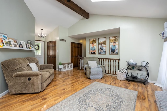 4 Aken Ct, Saint Peters, MO 63376 - living area featuring a chandelier, beam ceiling, wood finished floors, baseboards, and high vaulted ceiling