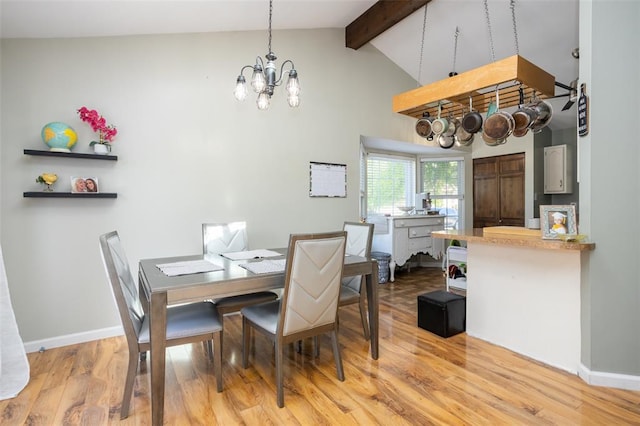 4 Aken Ct, Saint Peters, MO 63376 - dining area with a chandelier, beamed ceiling, light wood finished floors, baseboards, and high vaulted ceiling