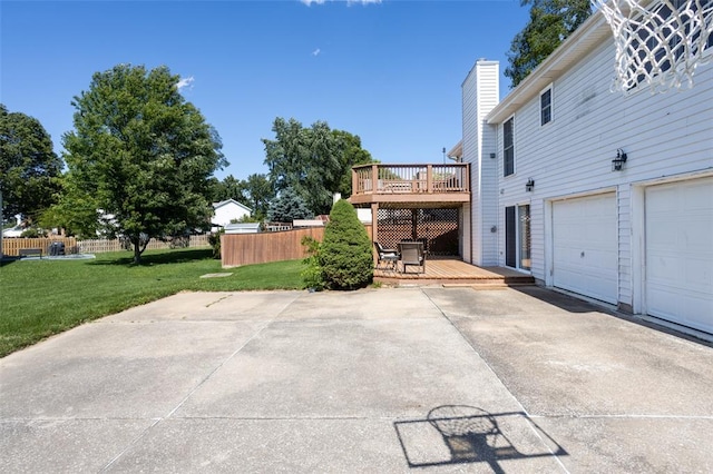 4 Aken Ct, Saint Peters, MO 63376 - view of property exterior with a deck, an attached garage, a chimney, and driveway
