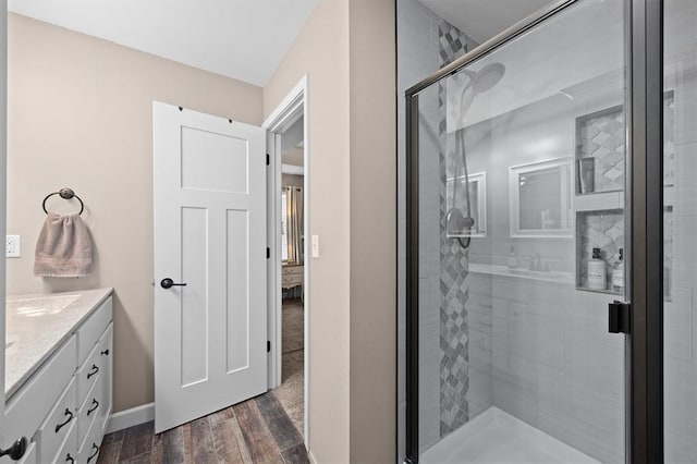 536 W 5th St, Saint Jacob, IL 62281 - full bath featuring a shower stall, vanity, wood finished floors, and baseboards