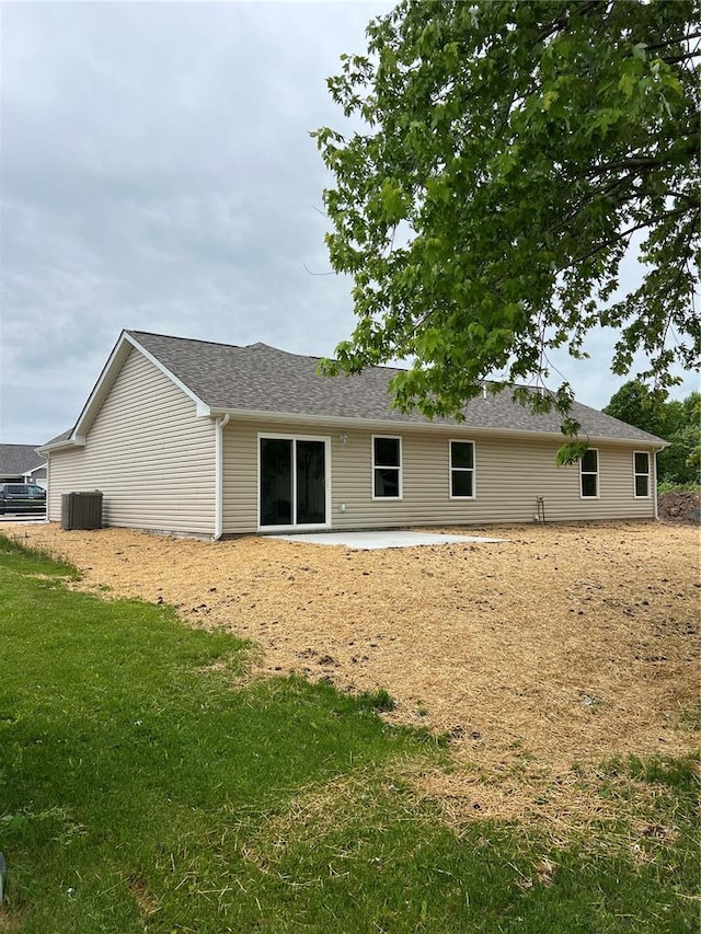 10 Jaybird Ct, Montgomery City, MO 63361 - rear view of house featuring central AC, a patio area, and a yard