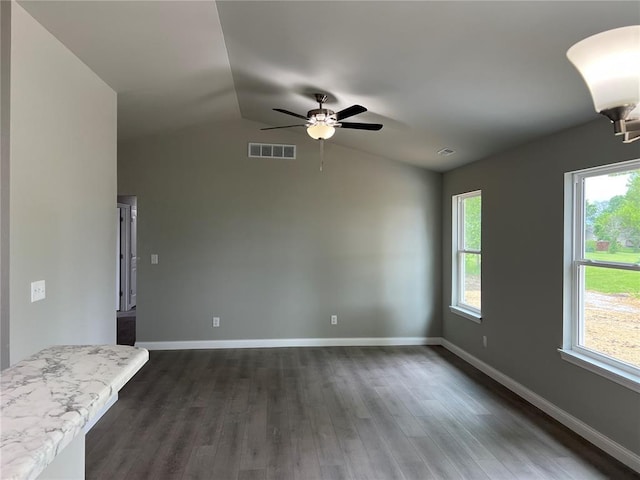 10 Jaybird Ct, Montgomery City, MO 63361 - unfurnished room featuring lofted ceiling, dark wood finished floors, a ceiling fan, and baseboards