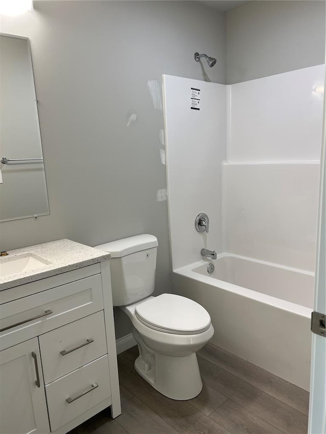 10 Jaybird Ct, Montgomery City, MO 63361 - bathroom featuring wood finished floors, shower / bath combination, vanity, and toilet