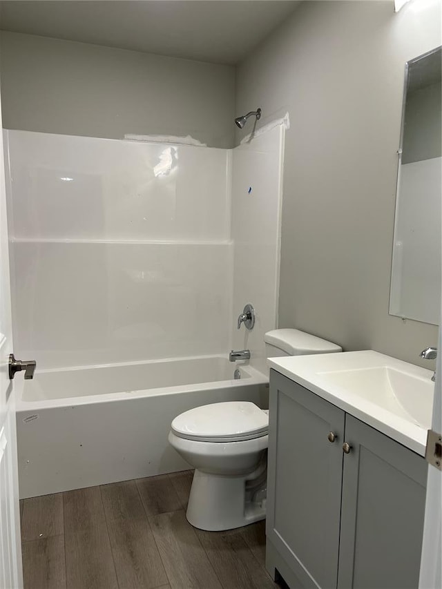 10 Jaybird Ct, Montgomery City, MO 63361 - full bathroom with wood finished floors, toilet, shower / washtub combination, and vanity