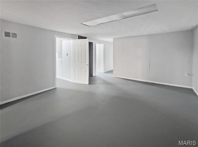 2540 Courtyard Pl, Florissant, MO 63031 - unfurnished room with finished concrete flooring and baseboards