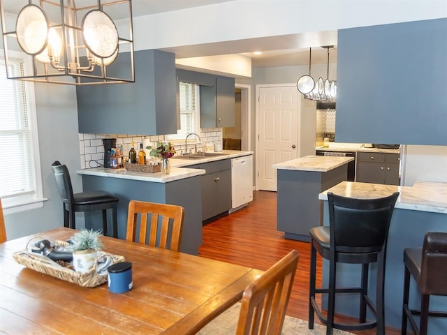 3930 Commanche Ave, Hannibal, MO 63401 - dining space featuring a chandelier and dark wood-style floors