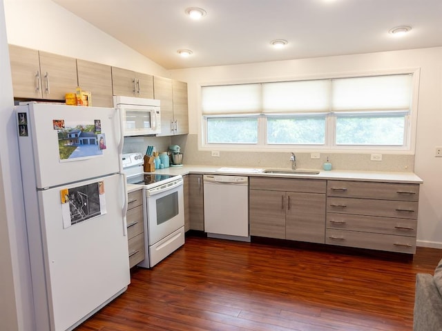 3930 Commanche Ave, Hannibal, MO 63401 - kitchen with white appliances, a sink, light countertops, dark wood-style flooring, and lofted ceiling