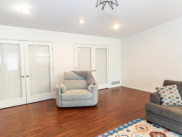 3930 Commanche Ave, Hannibal, MO 63401 - living area with french doors, wood finished floors, baseboards, and recessed lighting
