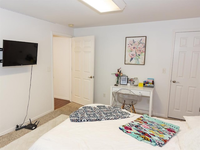 3930 Commanche Ave, Hannibal, MO 63401 - bedroom with baseboards and carpet