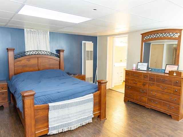 3930 Commanche Ave, Hannibal, MO 63401 - bedroom with a drop ceiling, wood finished floors, a heating unit, and connected bathroom