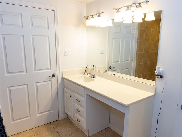 3930 Commanche Ave, Hannibal, MO 63401 - bathroom with vanity and tile patterned flooring