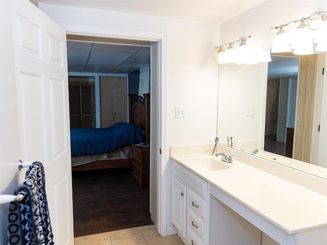 3930 Commanche Ave, Hannibal, MO 63401 - ensuite bathroom featuring vanity and tile patterned floors