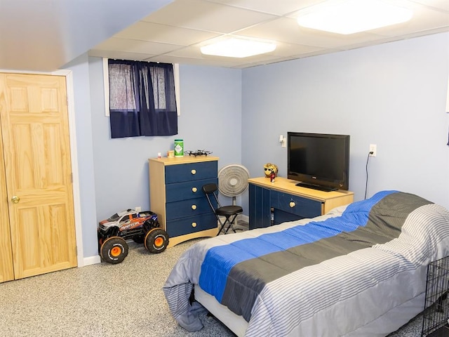 3930 Commanche Ave, Hannibal, MO 63401 - bedroom with baseboards and speckle patterned floor