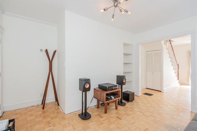 5156 Christy Ave, Saint Louis, MO 63116 - office space with a chandelier, baseboards, built in features, and crown molding