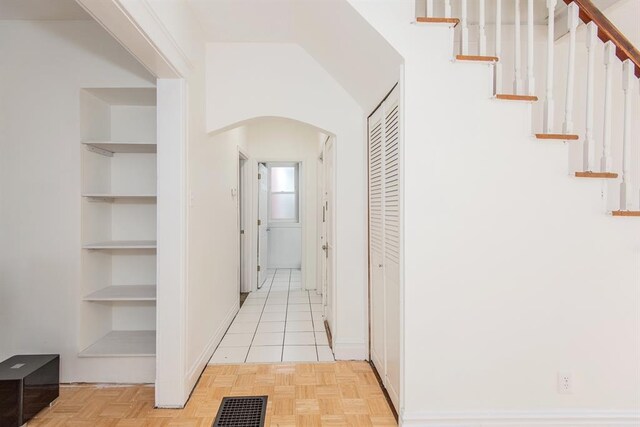 5156 Christy Ave, Saint Louis, MO 63116 - corridor with arched walkways and stairway