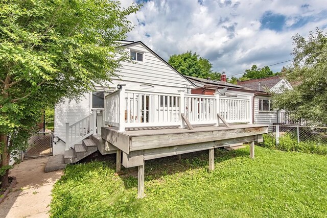 5156 Christy Ave, Saint Louis, MO 63116 - back of house with a wooden deck and a gate